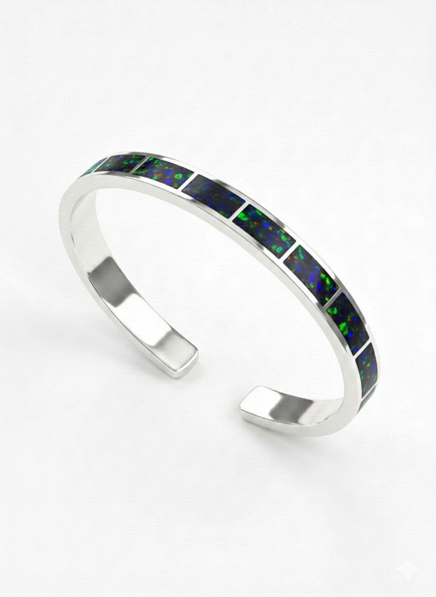 Silver bracelet with green and black stones