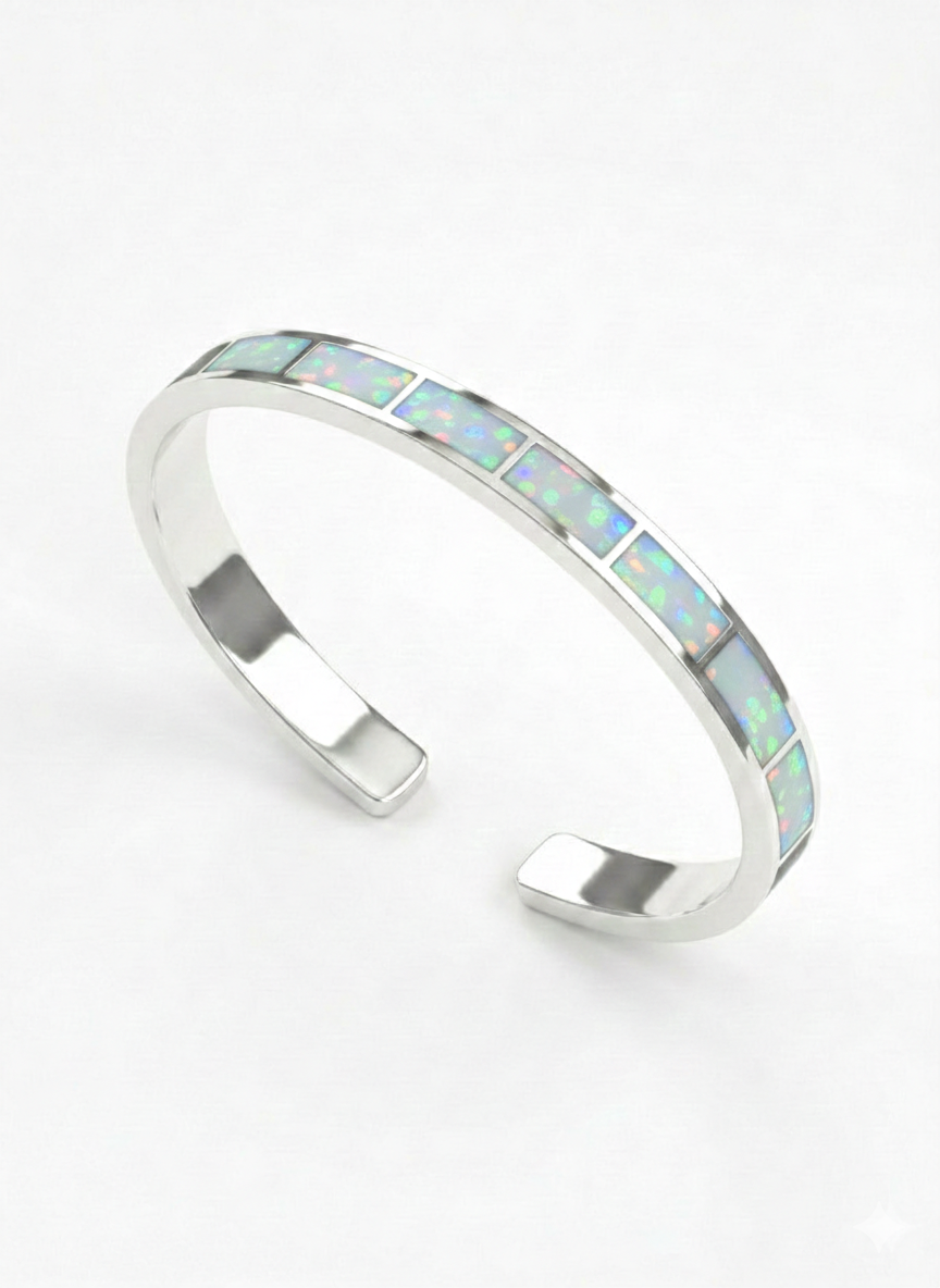 Silver bangle with opal stones